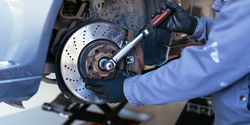 Image of mechanic fixing tire